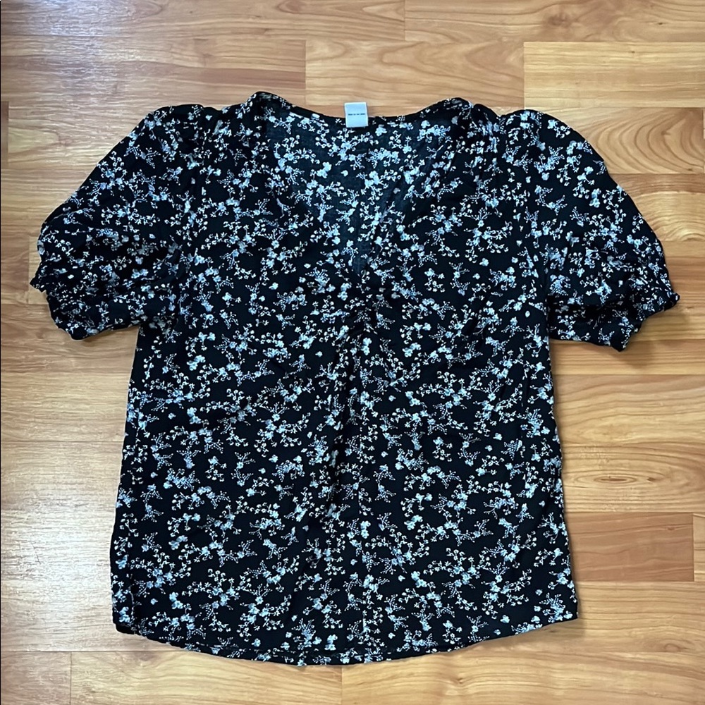 Black and floral-printed blouse